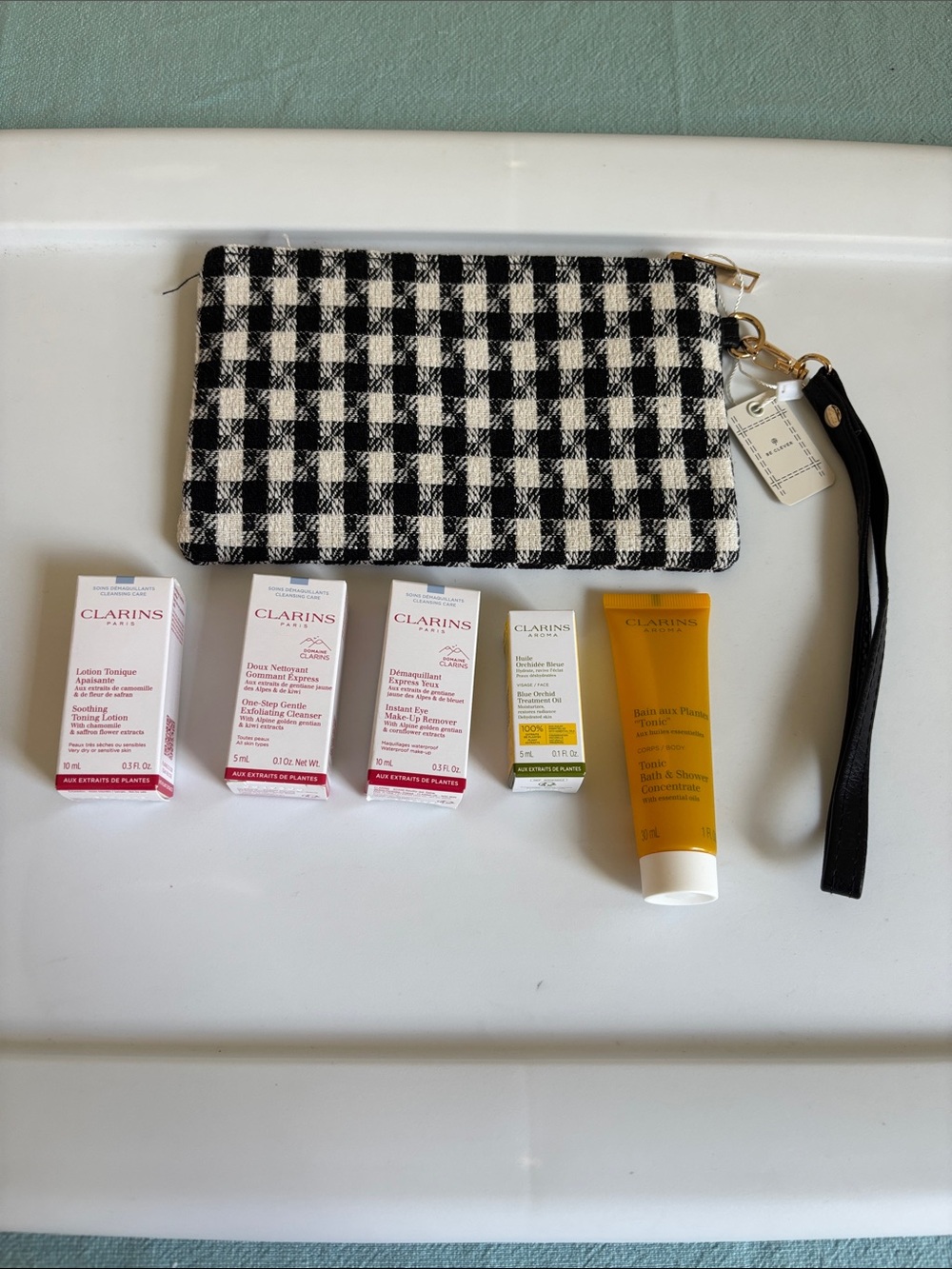 Clarins Black and White Gingham Pouch with Travel Skincare Set